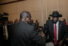 South Sudan President Salva Kiir (R) greets South Sudan Rebel leader Riek Machar during the 32nd Extra-Ordinary Summit of IGAD Assembly of Heads of State and Government in Addis Ababa, Ethiopia, June 21, 2018. PHOTO BY REUTERS/Presidential Press Service