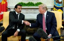 U.S. President Donald Trump meets Qatar's Emir Sheikh Tamim bin Hamad al-Thani in the Oval Office at the White House in Washington, DC, U.S., April 10, 2018. PHOTO BY REUTERS/Kevin Lamarque