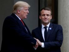 French President Emmanuel Macron shakes hands with U.S. President Donald Trump after a meeting at the Elysee Palace on the eve of the commemoration ceremony for Armistice Day, 100 years after the end of the First World War, in Paris, France, November 10, 2018. PHOTO BY REUTERS/Vincent Kessler
