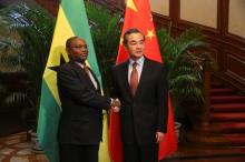 China's Foreign Minister Wang Yi and Sao Tome and Principe's Foreign Minister Urbino Botelho attend a signing ceremony for China and Sao Tome and Principe to establish official relations, in Beijing, China, December 26, 2016. PHOTO BY REUTERS/China Daily