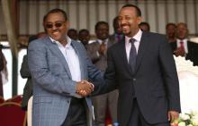 Ethiopia's newly elected prime minister Abiy Ahmed is greeted by deputy prime minister Demeke Mekonnen as he arrives for a rally during his visit to Ambo in the Oromiya region, Ethiopia, April 11, 2018. PHOTO BY REUTERS/Tiksa Negeri