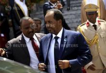 Somalia's President Hassan Sheikh Mohamud (C) walks out after attending Sudan's President Omar Hassan al-Bashir (not pictured) inauguration ceremony at National Assembly in Omdurman, June 2, 2015. PHOTO BY REUTERS/Mohamed Nureldin Abdallah