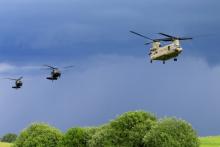 U.S. CH-47 Chinook and Black Hawk helicopters take part in Suwalki gap defence exercise in Mikyciai, Lithuania, June 17, 2017. PHOTO BY REUTERS/Ints Kalnins