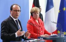 French President Francois Hollande and German Chancellor Angela Merkel address a news conference at the Chancellery in Berlin, Germany, May 19, 2015. PHOTO BY REUTERS/Fabrizio Bensch