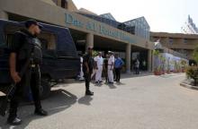 Egyptian police personnel stand guard outside Dar Al Fouad Hospital, where injured tourists who were mistakenly targeted in a military operation "chasing terrorist elements" are recovering, in Cairo, Egypt, September 14, 2015. PHOTO BY REUTERS/Mohamed Abd El Ghany