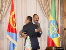 Ethiopia's Prime Minister Abiy Ahmed and Eritrean President Isaias Afwerk embrace at the declaration signing in Asmara, Eritrea July 9, 2018 in this photo obtained from social media on July 10, 2018. PHOTO BY REUTERS/GHIDEON MUSA ARON VISAFRIC