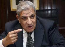 Ibrahim Mahlab, Egypt's newly appointed prime minister speaks to the media at his office in Cairo