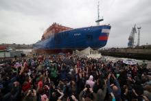 People attend the float out ceremony of the nuclear-powered icebreaker "Ural" at the Baltic Shipyard in St. Petersburg, Russia, May 25, 2019. PHOTO BY REUTERS/Anton Vaganov