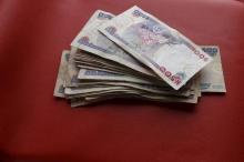 Nigerian naira notes are seen in this illustration, March 15, 2016. PHOTO BY REUTERS/Afolabi Sotunde