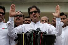 Cricket star-turned-politician Imran Khan, chairman of Pakistan Tehreek-e-Insaf (PTI), speaks to members of media after casting his vote at a polling station during the general election in Islamabad, Pakistan, July 25, 2018. PHOTO BY REUTERS/Athit Perawongmetha