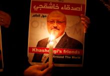 A demonstrator holds a poster with a picture of Saudi journalist Jamal Khashoggi outside the Saudi Arabia consulate in Istanbul, Turkey, October 25, 2018. PHOTO BY REUTERS/Osman Orsal