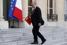French Defence Minister Jean-Yves Le Drian arrives to attend a meeting at the Elysee Palace in Paris July 24, 2014, after Air Algerie flight AH 5017 crashed on Thursday en route from Ouagadougou in Burkina Faso to Algiers. PHOTO BY REUTERS/Benoit Tessier