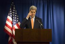 U.S. Secretary of State John Kerry reacts during a media briefing at the U.S. Embassy in London, February 21, 2015. PHOTO BY REUTERS/Neil Hall 
