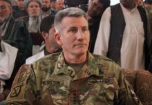 The commander of U.S. and NATO forces in Afghanistan General John W. Nicholson sits during his visits from Kunduz province, Afghanistan, March 22, 2016. PHOTO BY REUTERS/Stringer