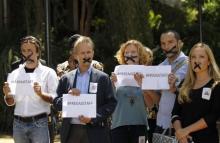 Kenya-based foreign journalists demonstrate against the imprisonment of three Al Jazeera journalists in Egypt, at the United Nations Environment programme (UNEP) headquarters in Nairobi January 13, 2015, as a reception by Egypt's Foreign Minister Sameh Shoukry took place nearby. PHOTO BY REUTERS/Thomas Mukoya