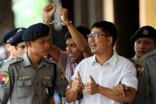 Detained Reuters journalist Wa Lone and Kyaw Soe Oo arrive at Insein court in Yangon, Myanmar, August 27, 2018. PHOTO BY REUTERS/Ann Wang