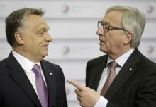 European Commission President Jean-Claude Juncker (R) speaks to Hungary's Prime Minister Viktor Orban before the Eastern Partnership Summit session in Riga, Latvia, May 22, 2015. PHOTO BY REUTERS/Ints Kalnins