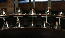 South Africa's Chief Justice Mogoeng Mogoeng (Top, C) looks on with other judges before making a ruling at the Constitutional Court in Johannesburg, South Africa, June 22,2017. PHOTO BY REUTERS/Siphiwe Sibeko