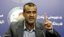 Kadhim al-Sayadi, a lawmaker, speaks during a news conference in Baghdad, August, 11, 2015. PHOTO BY REUTERS/Ahmed Saad
