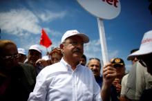 Turkey's main opposition Republican People's Party (CHP) leader Kemal Kilicdaroglu walks during a protest, dubbed "justice march", against the detention of his party's lawmaker Enis Berberoglu, on the outskirts of Ankara, Turkey, June 17, 2017. PHOTO BY REUTERS/Osman Orsal