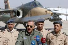 Iraqi Defence Minister Khaled al-Obeidi speaks during a news conference at an air base in Baghdad, March 26, 2015. PHOTO BY REUTERS/Khalid al-Mousily