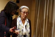 South Korean Kim Bok-tong, who says she was forced to work in Japan's wartime military brothels, arrives at a news conference at the Foreign Correspondent's Club of Japan in Tokyo, April 24, 2015. PHOTO BY REUTERS/Thomas Peter