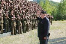North Korean leader Kim Jong Un waves during an inspection at the commanding headquarters of the 264 Combined Forces, in this undated photo released by North Korea's Korean Central News Agency (KCNA) in Pyongyang, May 24, 2015. PHOTO BY REUTERS/KCNA