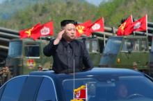 North Korea's leader Kim Jong Un watches a military drill marking the 85th anniversary of the establishment of the Korean People's Army (KPA) in this handout photo by North Korea's Korean Central News Agency (KCNA) made available, April 26, 2017. PHOTO BY REUTERS/KCNA