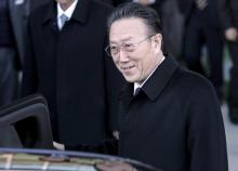 North Korean spy chief Kim Yang Gon gets in a car upon his arrival at the transit office near the truce village of Panmunjom in the demilitarized zone that separates the two Koreas in Paju, north of Seoul, in this file picture taken November 29, 2007. PHOTO BY REUTERS/Han Jae-Ho