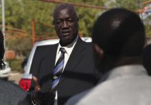 South Sudan's Defence Minister Kuol Manyang Juuk, talks to cabinet members after a cabinet meeting in Juba, January 17, 2014. PHOTO BY REUTERS/Andreea Campeanu