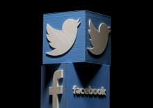 3D-printed Facebook and Twitter logos are seen in this picture illustration made in Zenica, Bosnia and Herzegovina on January 26, 2016. PHOTO BY REUTERS/Dado Ruvic