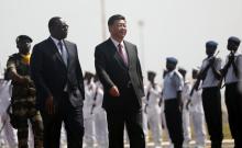 Chinese President Xi Jinping walks with Senegal's President Macky Sall after arriving at the Leopold Sedar Senghor International Airport, at the start of his visit to Dakar, Senegal, July 21, 2018. PHOTO BY REUTERS/Mikal McAlliste