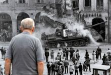 A man looks at a picture, commemorating the 50th anniversary of the Soviet-led invasion into former Czechoslovakia, placed on a street in Liberec, Czech Republic, August 21, 2018. PHOTO BY REUTERS/David W Cerny