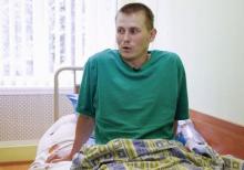 A man, according to Ukraine's state security service (SBU) named Alexander Alexandrov who is one of two Russian servicemen recently detained by Ukrainian forces, speaks during an interview with Reuters at a hospital in Kiev, Ukraine, May 28, 2015. PHOTO BY REUTERS/Valentyn Ogirenko