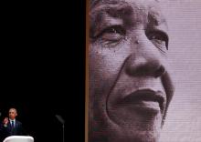 Former U.S. President Barack Obama delivers the 16th Nelson Mandela annual lecture, marking the centenary of the anti-apartheid leader's birth, in Johannesburg, South Africa, July 17, 2018. PHOTO BY REUTERS/Siphiwe Sibeko