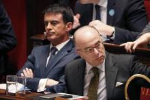 French Prime Minister Manuel Valls (L) and Interior Minister Bernard Cazeneuve attend a debate at the National Assembly in Paris, France, November 19, 2015. PHOTO BY REUTERS/Charles Platiau