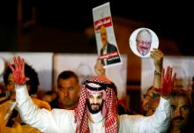 A demonstrator wearing a mask of Saudi Crown Prince Mohammed bin Salman attends a protest outside the Saudi Arabia consulate in Istanbul, Turkey, October 25, 2018. PHOTO BY REUTERS/Osman Orsal