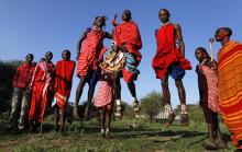 Maasai morans sing traditional songs and jump before the Maasai Olympics 2014 at the Sidai Oleng wildlife sanctuary at the base of Mt. Kilimanjaro near the Kenya-Tanzania border in Kajiado December 13, 2014. PHOTO BY REUTERS/Thomas Mukoya
