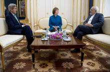 (L-R) U.S. Secretary of State John Kerry, European Union Foreign Policy Chief Catherine Ashton, and Iran's Foreign Minister Mohammad Javad Zarif participate in a trilateral meeting in Vienna, October 15, 2014. PHOTO BY REUTERS/Carolyn Kaster