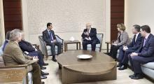 Syria's President Bashar al-Assad (center L) meets with a French delegation headed by Senate member, Head of the Senate’s French-Syrian Friendship Committee Jean-Pierre Vial,(center R) in Damascus, February 25, 2015. PHOTO BY REUTERS/SANA