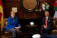 German Chancellor Angela Merkel meets with Jordan's King Abdullah II at the Royal Palace in Amman, Jordan, June 21, 2018. PHOTO BY REUTERS/Muhammad Hamed