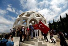 People visit the Martyrs' Memorial on the first anniversary of the attempted coup near the July 15 Martyrs' Bridge, known as the Bosphorus Bridge, in Istanbul, Turkey, July 16, 2017. PHOTO BY REUTERS/Murad Sezer