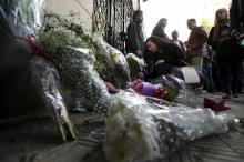 People attend a memorial for Giulio Regeni outside the Italian embassy in Cairo, Egypt, February 6, 2016. PHOTO BY REUTERS/Mohamed Abd El Ghany