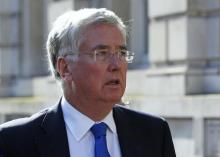 Britain's Defence Secretary Michael Fallon arrives for a Cobra meeting at the Cabinet Office in London, October 8, 2014. PHOTO BY REUTERS/Luke MacGregor