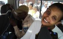 Ethiopian opposition leader, Birtukan Mideksa, speaks to reporters from the window of a prison van after being freed from prison in Addis Ababa, October 6, 2010. PHOTO BY REUTERS/Stringer