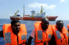 Migrants are rescued by SOS Mediterranee organisation and Doctors Without Borders during a search and rescue (SAR) operation with the MV Aquarius rescue ship in the Mediterranean Sea, off the Libyan Coast, August 10, 2018. PHOTO BY REUTERS/Guglielmo Mangiapane