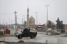 A military vehicle of Iraqi Special Operations Forces (ISOF) is seen in the streets of Qadisiyah neighborhood, north of Mosul, Iraq, December 14, 2016. PHOTO BY REUTERS/Alaa Al-Marjani