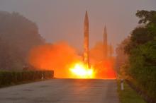 Ballistic rocket is seen launching during a drill by the Hwasong artillery units of the KPA Strategic Force, July 2016. PHOTO BY REUTERS/KCNA