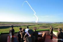 North Korean leader Kim Jong Un watches the test of a new-type anti-aircraft guided weapon system organised by the Academy of National Defence Science in this undated photo released by North Korea's Korean Central News Agency (KCNA), May 28, 2017. PHOTO BY KCNA/via REUTERS