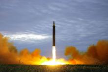 A missile is launched during a long and medium-range ballistic rocket launch drill in this undated photo released by North Korea's Korean Central News Agency (KCNA) in Pyongyang on August 30, 2017. PHOTO BY REUTERS/KCNA